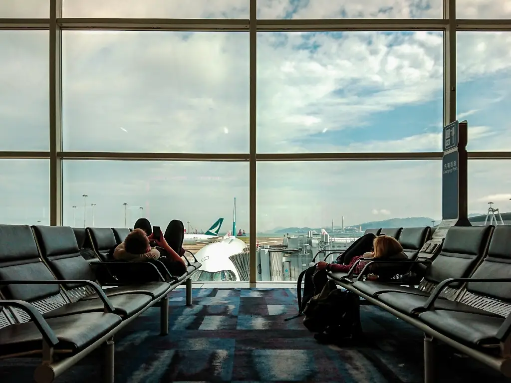 people waiting for flight at the airport