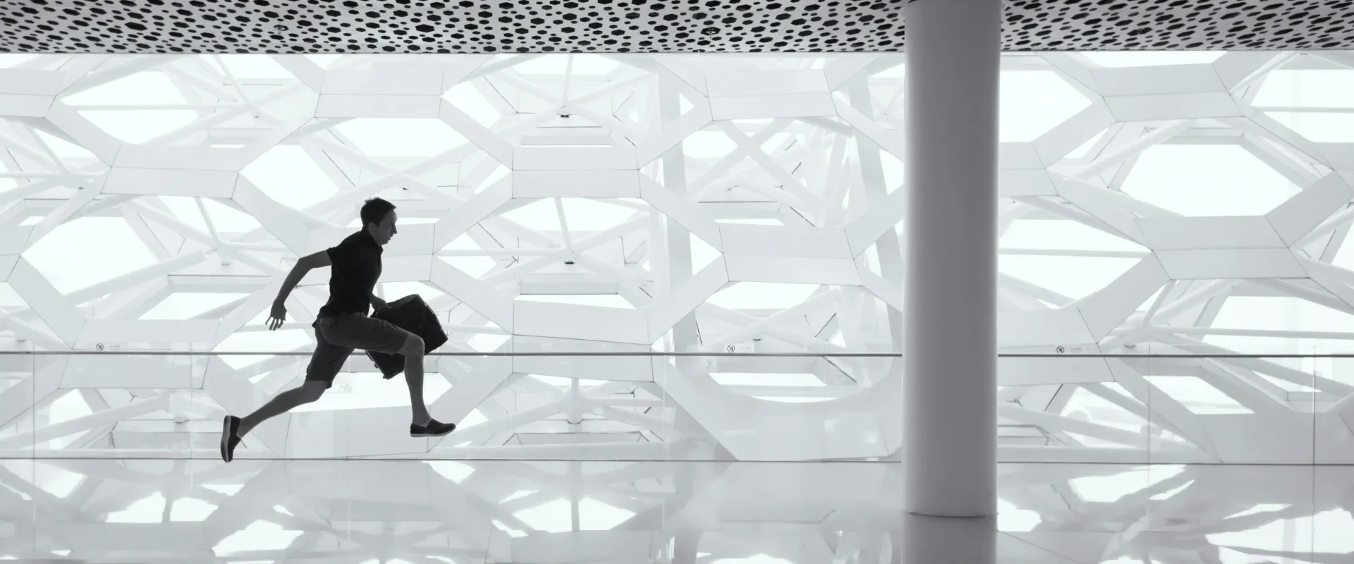 Man runs through airport