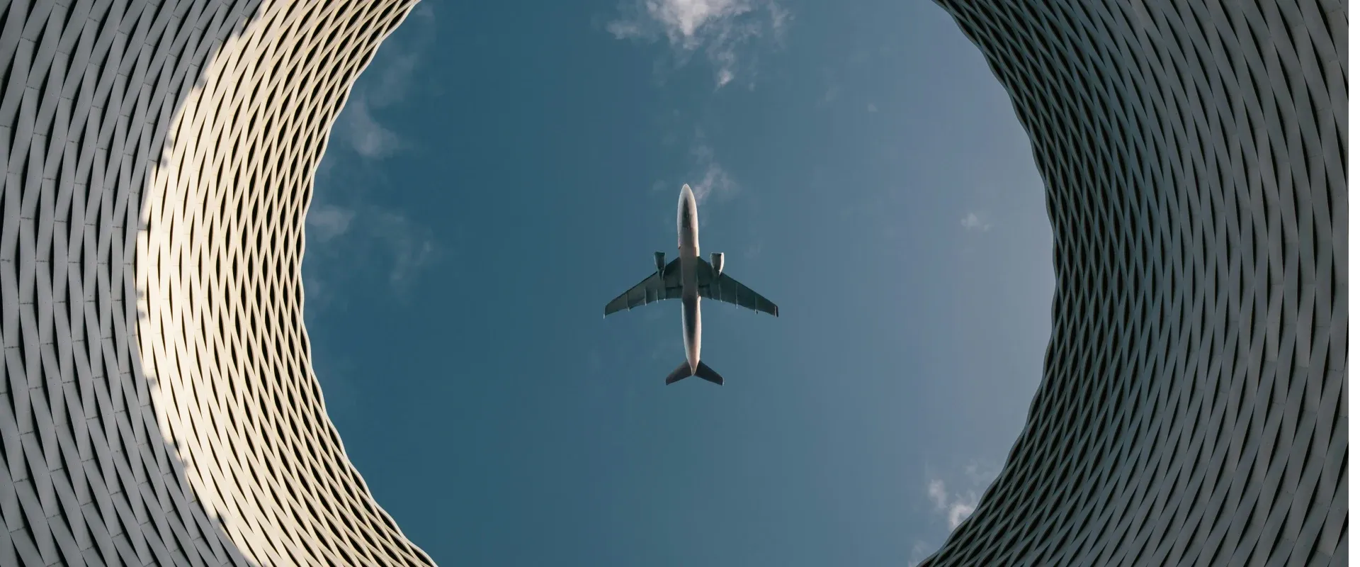 Underbelly of a plane as it flies overhead